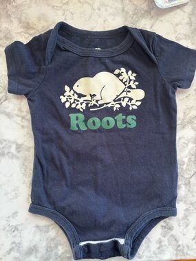 Roots Navy Blue Baby Onesie with White Beaver Graphic and Green Logo